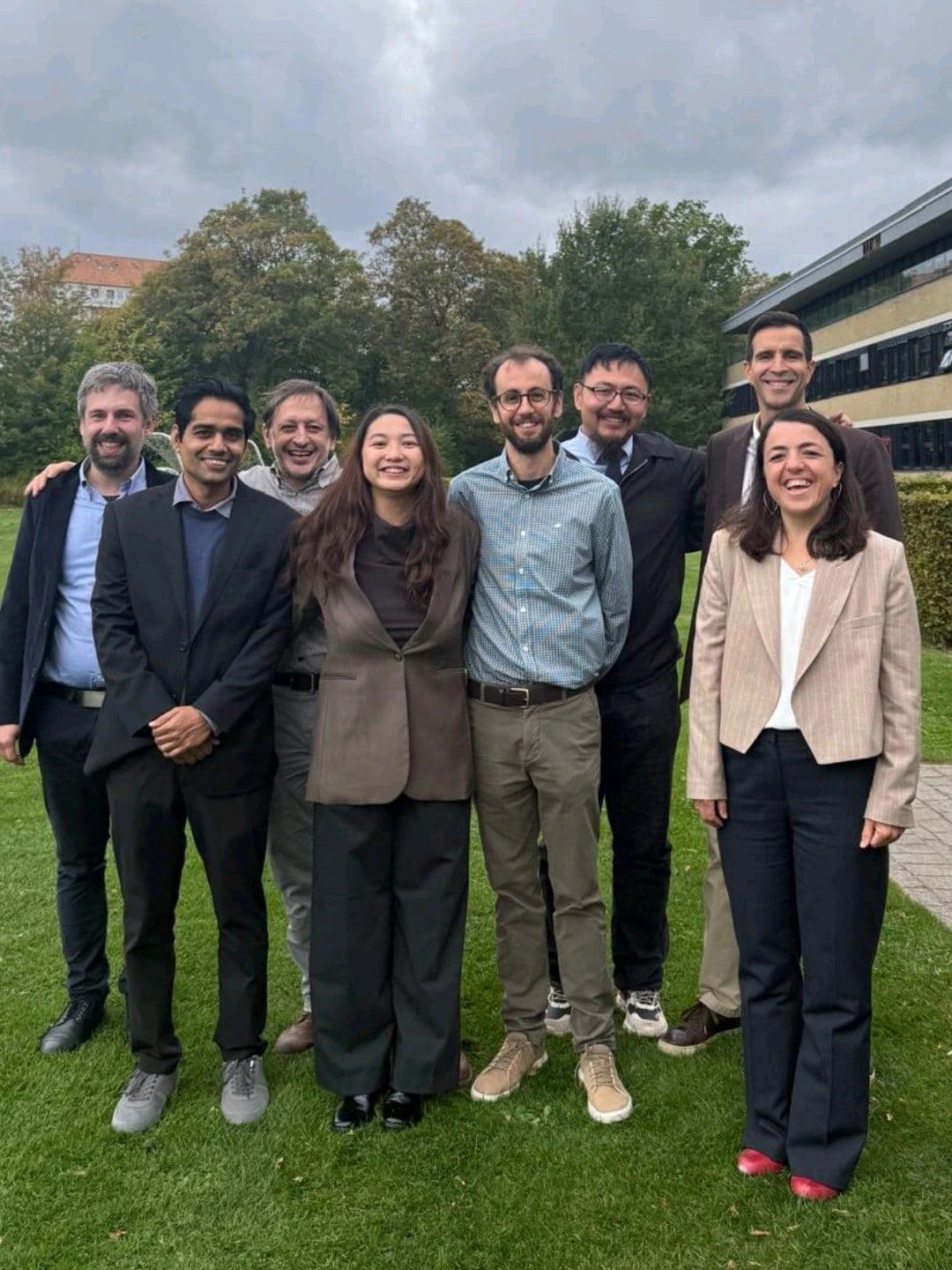 Group photograph celebrating Xiaoyi Wu's PhD viva at DTU